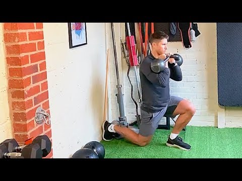 Dual Kettlebell Reverse Lunge + One-Arm Press