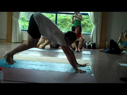Noah Maze Anusara yoga - Jumping to Urdvha Kukkutasana from