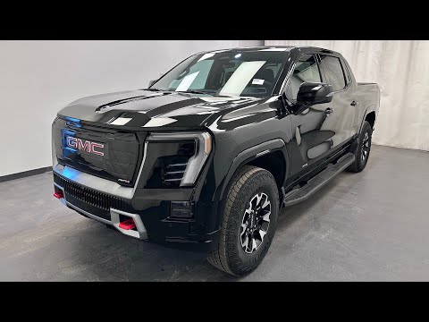 2026 GMC Sierra EV e4WD Crew Cab Max Range AT4 in Black for sale at Davis GMC Buick Lethbridge in Lethbridge, AB
