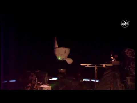 See SpaceX's 1st automated uncrewed docking at space station