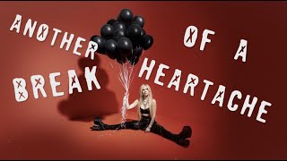 Musik-Video-Miniaturansicht zu Break Of A Heartache Songtext von Avril Lavigne