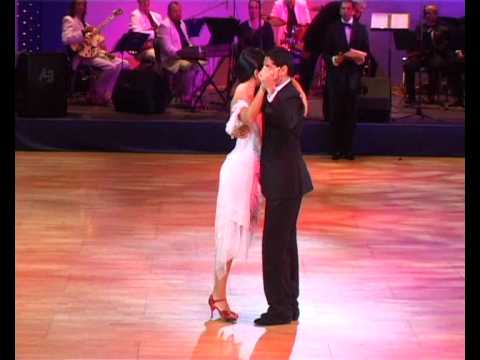  Diego Arizaga  and  Natacha Poberaj  are  dancing  to  the  tango  "  Danzarin  "  or  "  Mandria  "