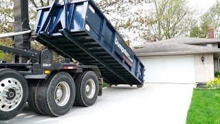 How a Roll Off Dumpster is Delivered