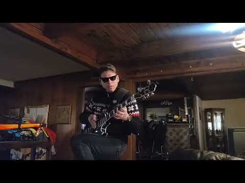 Grote Les Paul style guitar with EMG pickups and electronics.