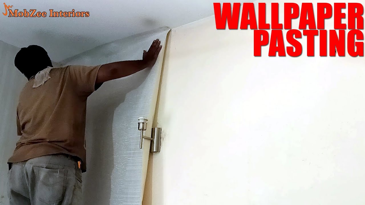Wallpaper Pasting  I Fixing of Wallpaper in Residence at PECHS Karachi - Pakistan I MobZee Interiors