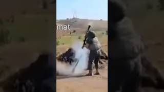 Moment Russian soldier accidentally fires RPG at his own FEET