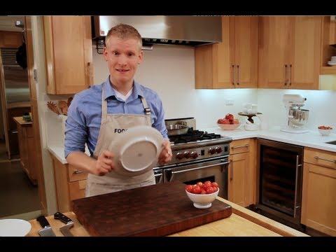 How to Cut Cherry Tomatoes with Two Plates | Food & Wine