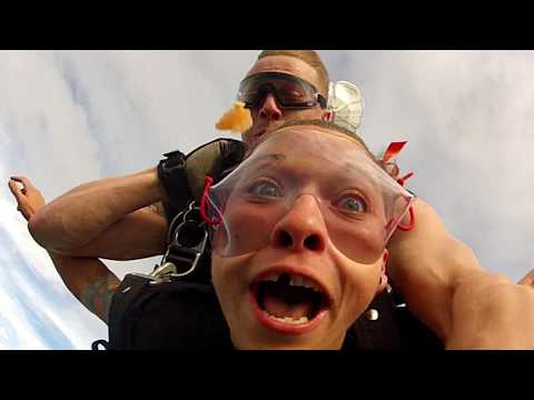Watch This Girl Lose Her Fake Tooth While Skydiving