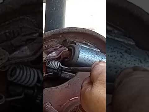 Drum brake adjustment .