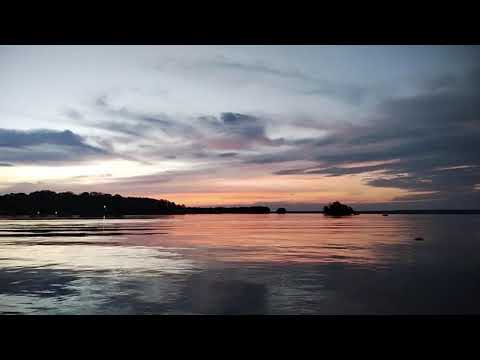 Time lapse of boats and sunset