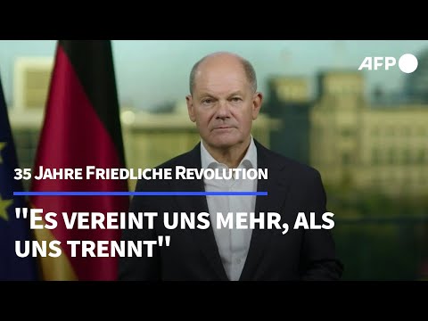 35 Jahre Friedliche Revolution: Scholz ruft zur Einheit auf | AFP