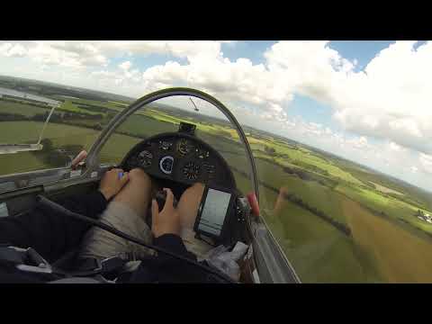 Glider landing in a field. My first outlanding.