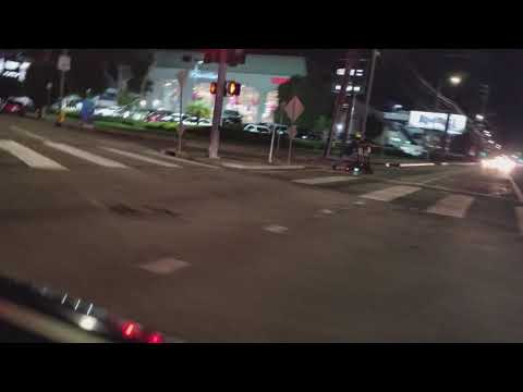 Guy J-Rides across Bundy / Olympic Intersection with 5 Bird Scooters