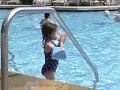 Ella And Bradford Playing In Pool At Grand Cypress