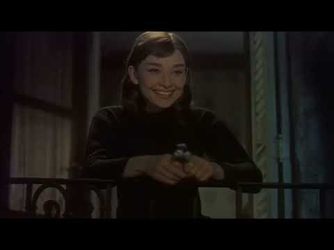Funny Face (1957) trailer still of Audrey Hepburn and Fred Astaire hinting at Gershwin songs and Paris-set glamour