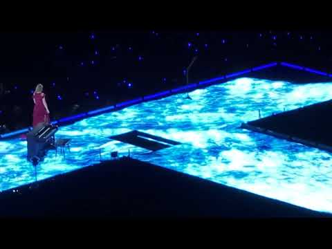 Taylor diving into the stage