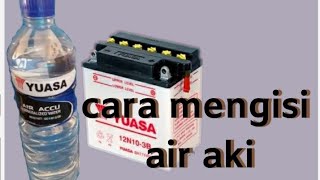 cara mengisi air aki