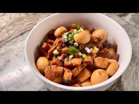 Braised pork belly with quail eggs