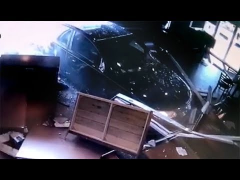Car plows into restaurant