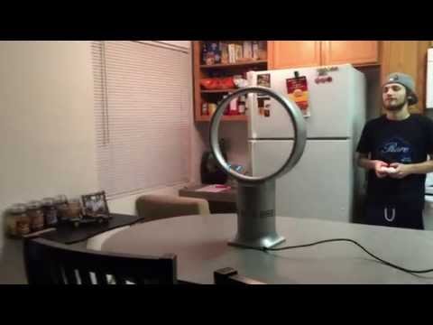 Quad Copter Flies Through Fan