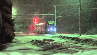 preview picture of video 'Trains in the evening snow (Croatia)  (4K)'