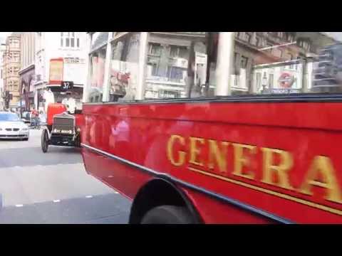 Unique prewar London bus line-up turning into Oxford Street