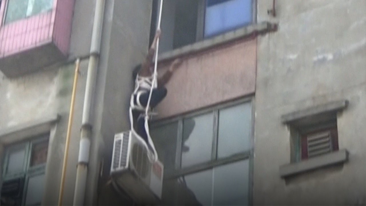 63-year-old woman attempts to rappel into locked home