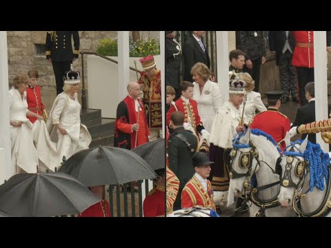 Charles III and Queen Camilla leave Westminster Abbey after the coronation | AFP