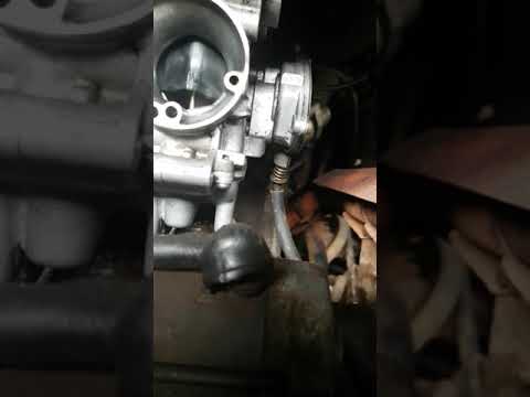 Backfire forces carburettor away from intake manifold