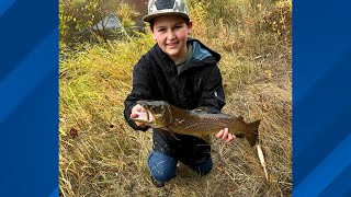 Young angler hooks giant 2-foot trout on Deschutes River