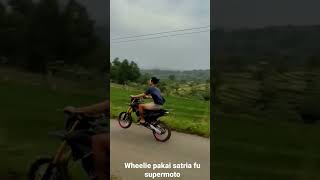 Download lagu wheelie pake satria fu supermoto mp3