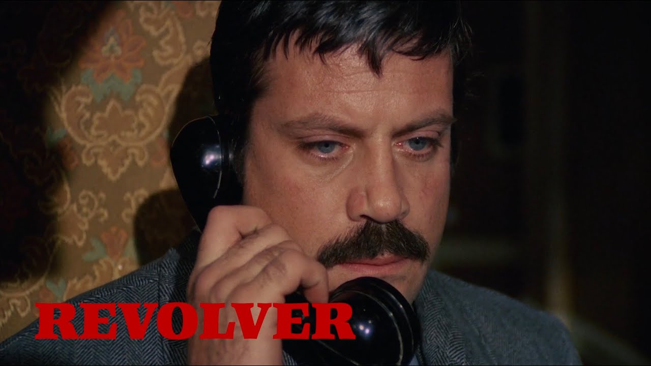 REVOLVER "We've just kidnapped your wife!" Clip