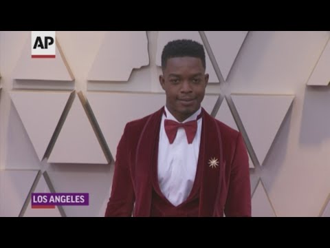 From Stephan James' red velvet tux to Billy Porter's tuxedo gown and Chadwick Boseman's tail jacket with sequins, men pushed the envelope at the Academy Awards. (Feb. 24)