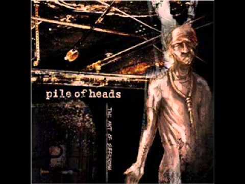 Pile of Heads - What We Feed Off