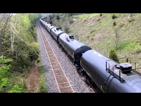 CN U710 w/ CN 5708, CN 2222 & BNSF 8044 lead this long EB Loaded Crude Oil train under Stacy Rd