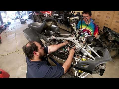 warrior 350 part 3 rebuild piston, rings, top end first fire.