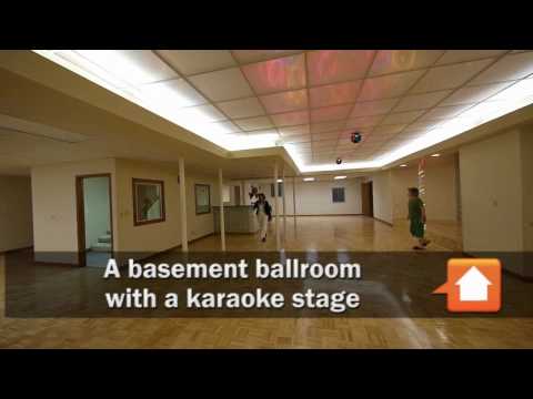 A basement ballroom and karaoke stage in a Riverwoods home