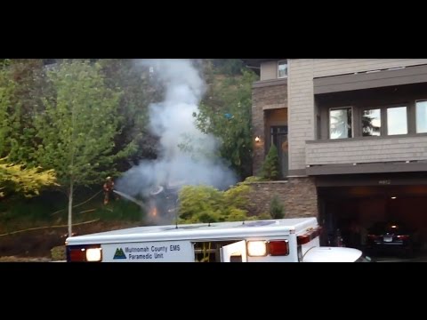 Neighbor records car fire after Skyline Blvd. crash