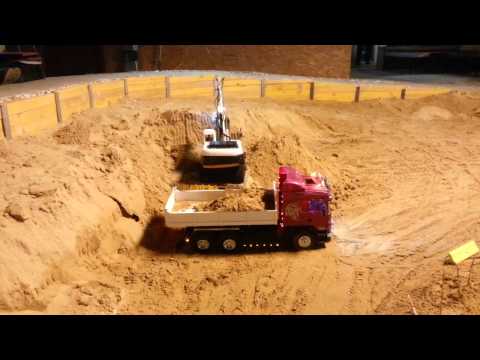 CAT 325 Load Scania 6 x 6