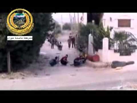 رصد للاشتباكات بين مقاتلي كتيبة شهداء الصنمين وقوات النظام في الحاجز الرباعي في كفر شمس في ريف درعا