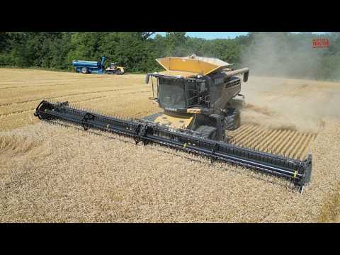 CLAAS Lexion 760 TT Combine  Harvesting Wheat with a CAT 65C Tractor