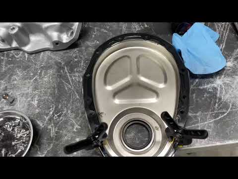 How to install a new timing Cover on a Chevy SBC 350 without removing the oil pan .