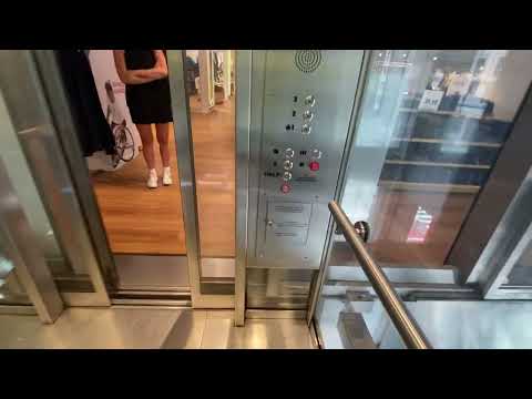 Fantastic Glass MEI hydraulic elevators @ Uniqlo - Fifth Avenue NYC