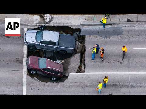 Video Thumbnail: Sinkhole swallows two cars in Nebraska