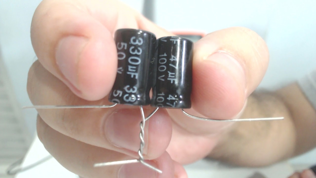 543 - Divisão da Tensão em Capacitores em Série