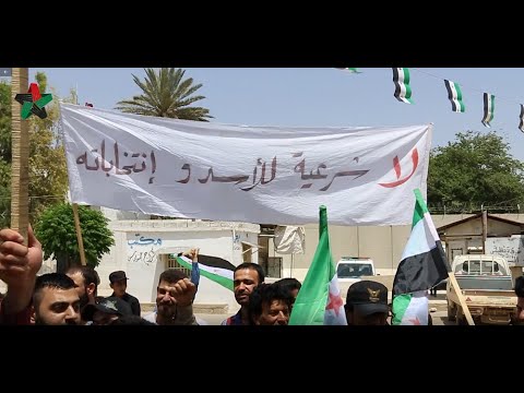 مظاهرة بحضور أعضاء الائتلاف الوطني رفضاً لانتخابات الأسد في بلدة جنديرس التابعة لمنطقة عفرين في محافظة حلب