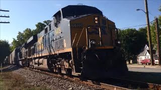 preview picture of video 'CSX 5409 and 414 lead the 84-car Q268 through Greenwood Indiana on 24 September 2013'