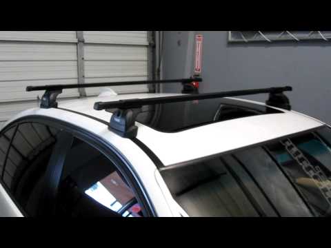 BMW 3 Series with Thule 460 Podium Base Roof Rack by Rack Outfitters