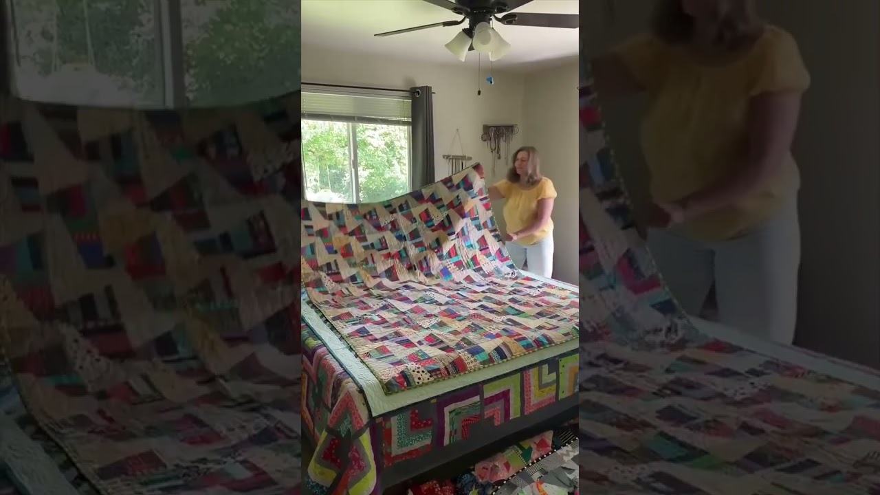 Scrap Quilts on the Bed