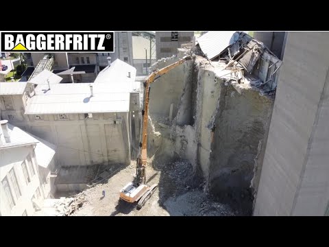 Liebherr R954C VH-HD 34m demolition excavator at work - drone view